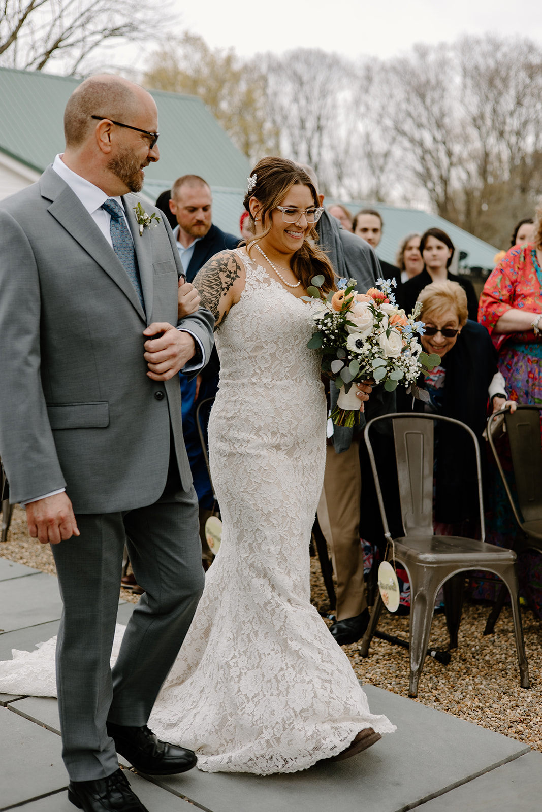 Bride walking down the aisle with her dad.