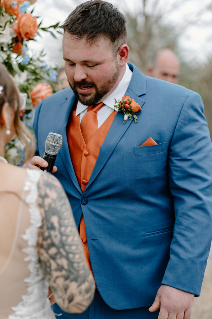 Groom reciting his vows.