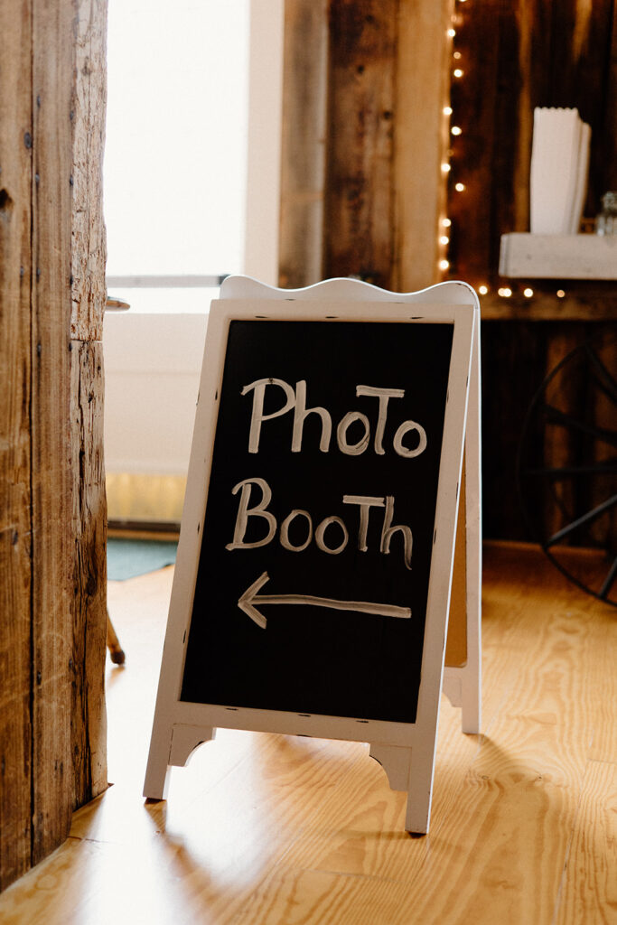 Chalkboard wedding photo booth sign.