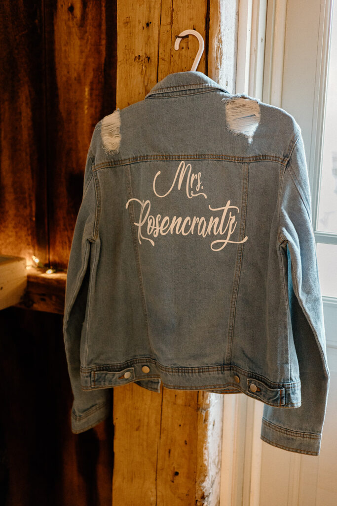 Rustic wedding distressed jean jacket that says Mrs. Rosencrantz.