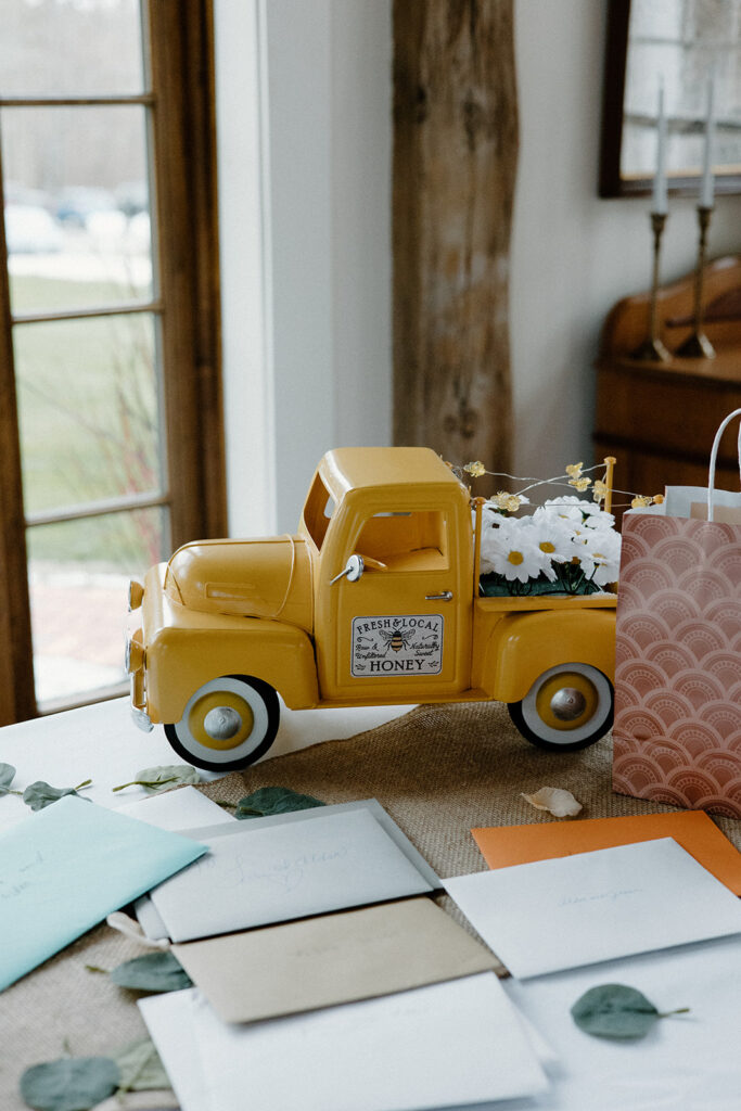 Wedding gift table with rustic truck decor.