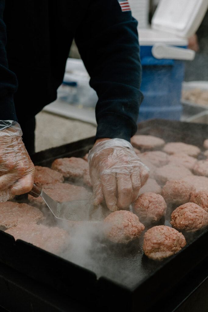 Papa Joe's Humble Kitchen cooking burgers.