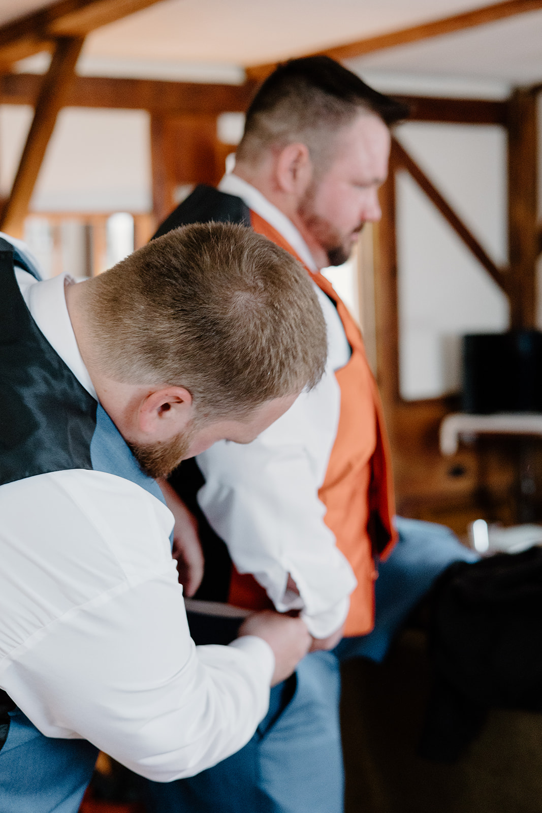 Rustic wedding groom getting ready photo.