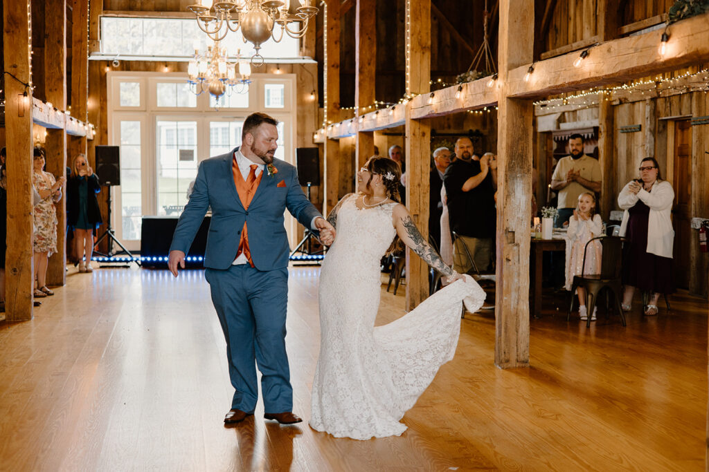 Barn wedding bride and groom entrance and first dance.