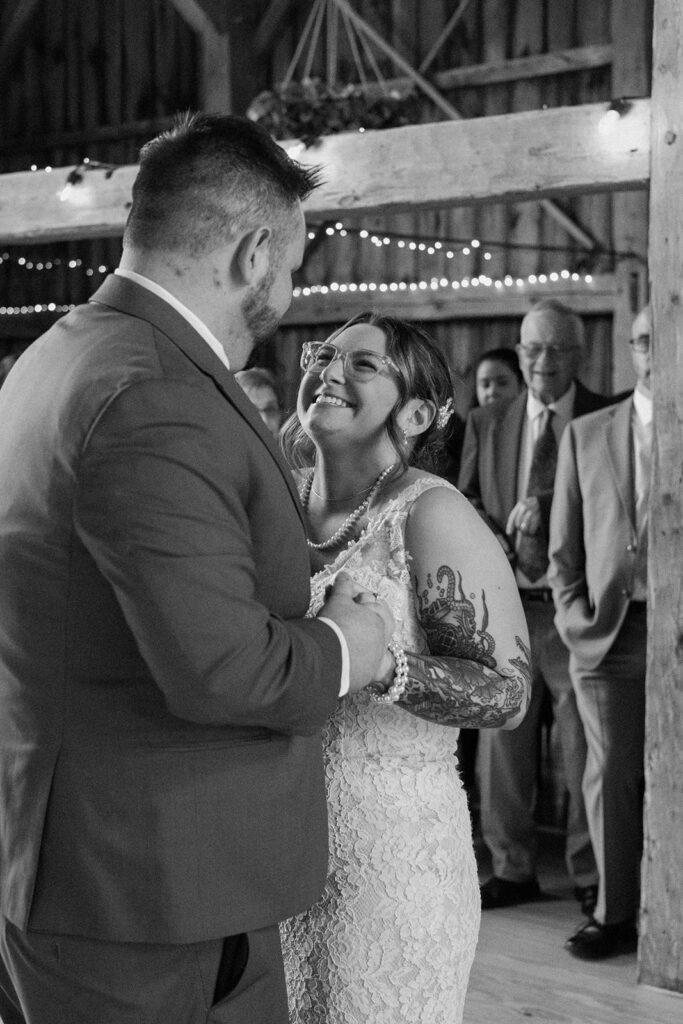 Bride looking lovingly at her groom during their first dance.