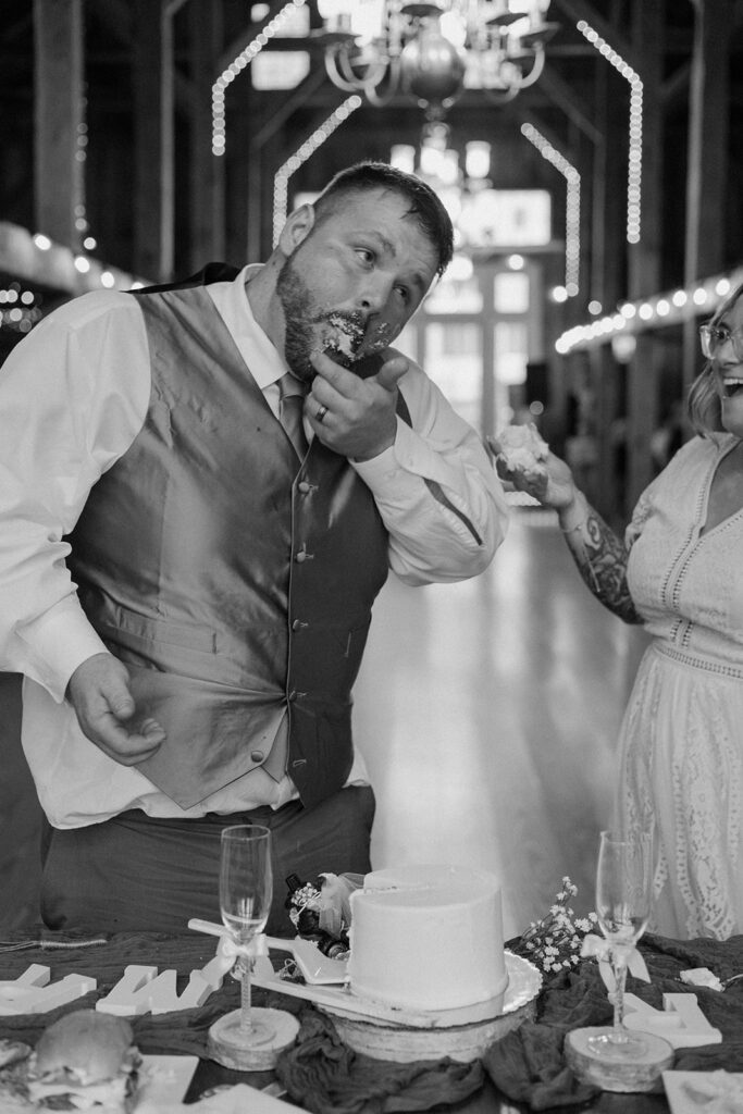 Bride and groom cake cutting ceremony.