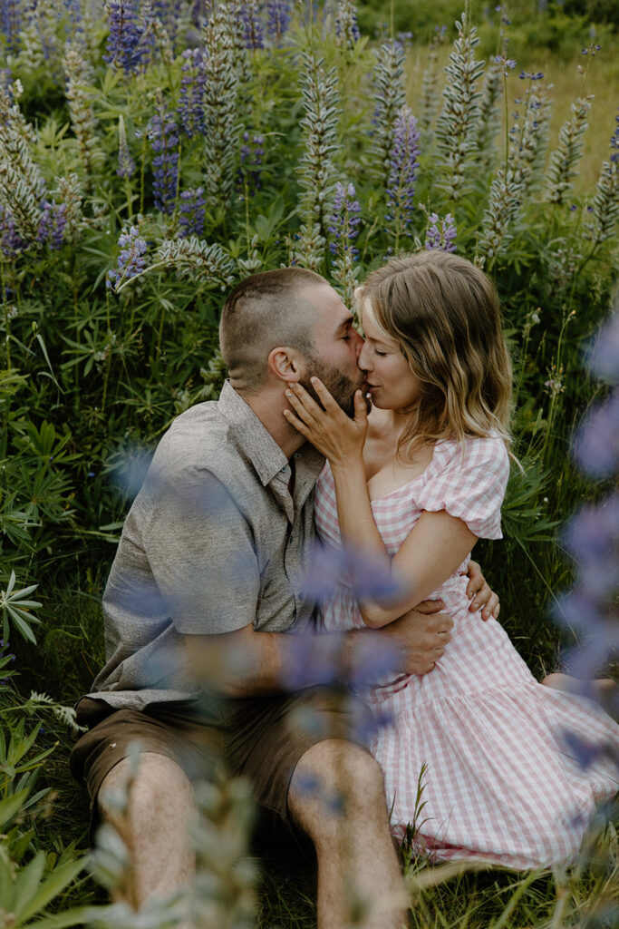 Romantic engagement photo session at Wild Lupine Fields in Maine.