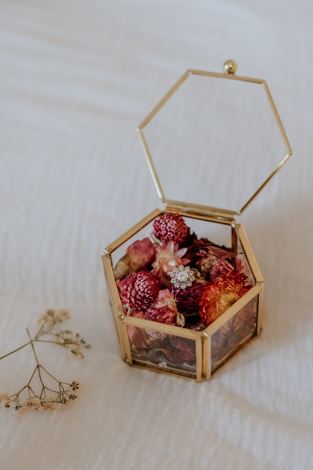 Wedding ring detail flat lay.