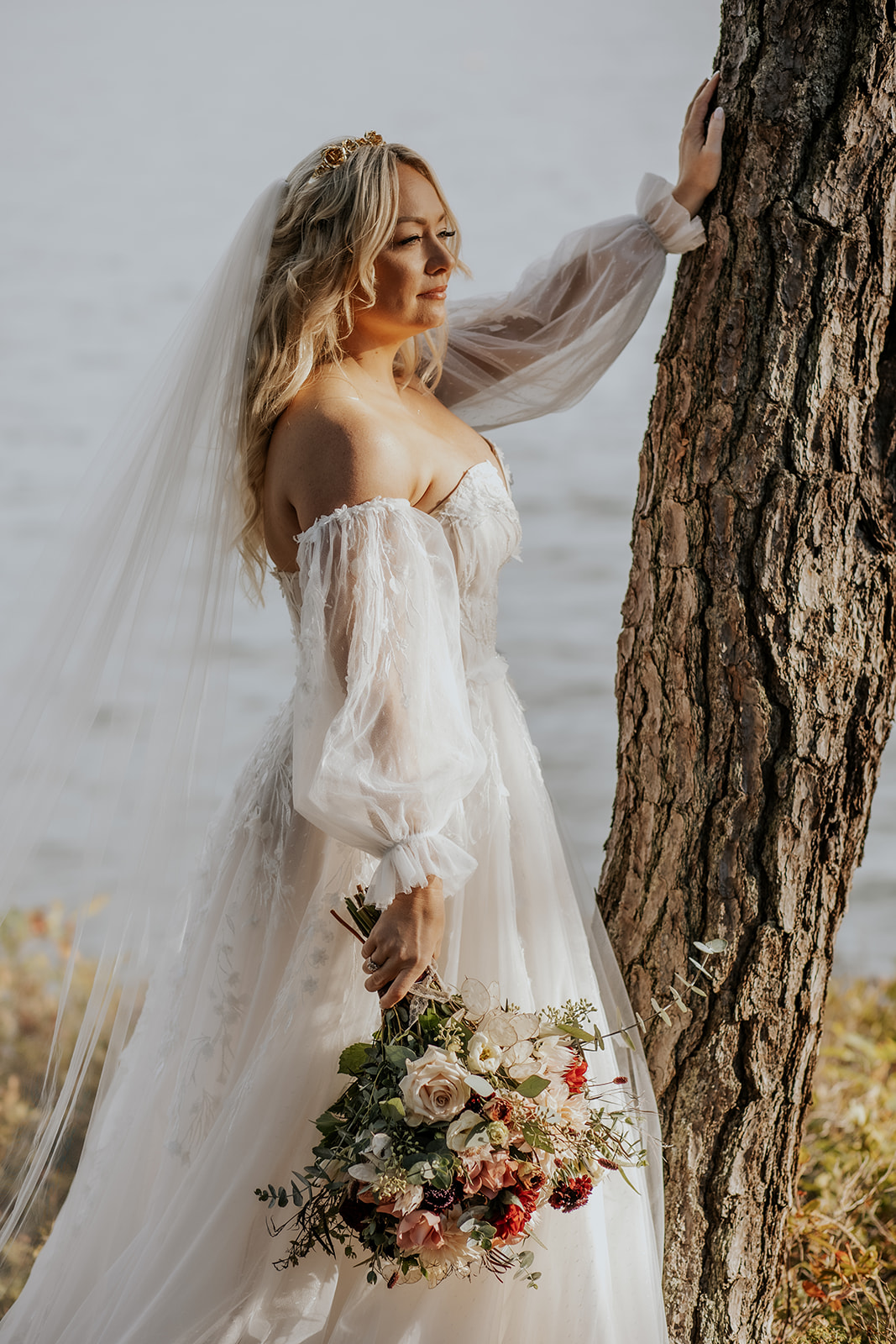 Bridal portrait next to a tree in coastal Maine.