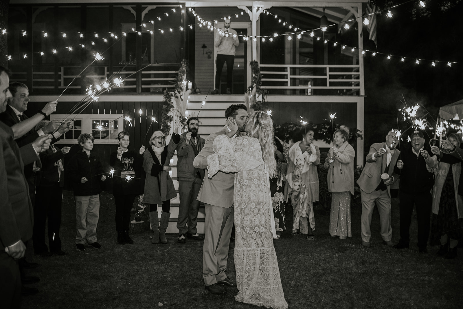 Bride and groom sparkler exit.