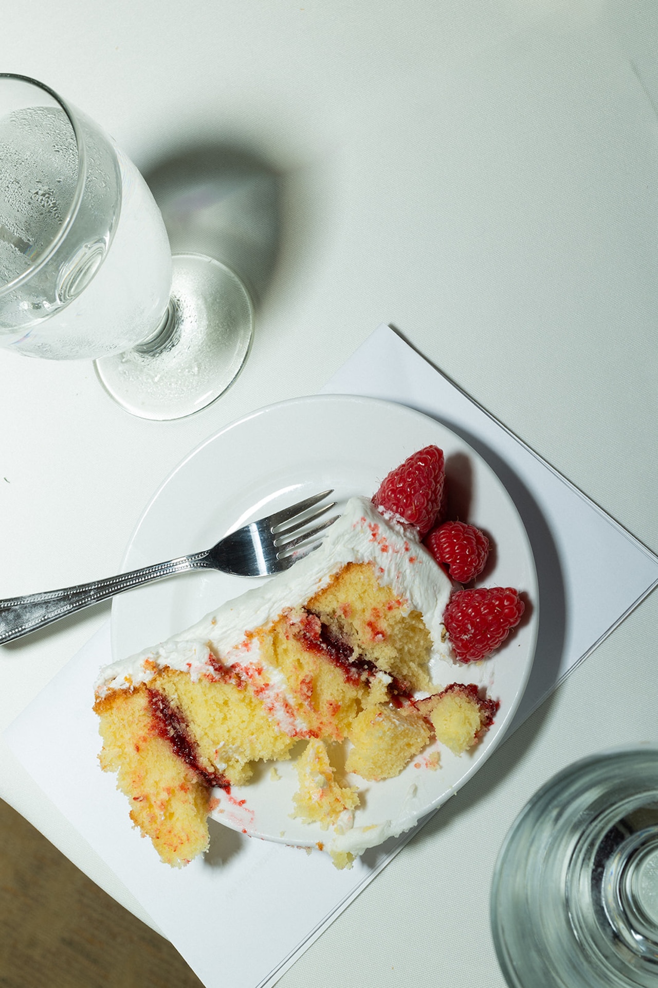 Wedding cake detail from a colorful weddings reception with vibrant decor