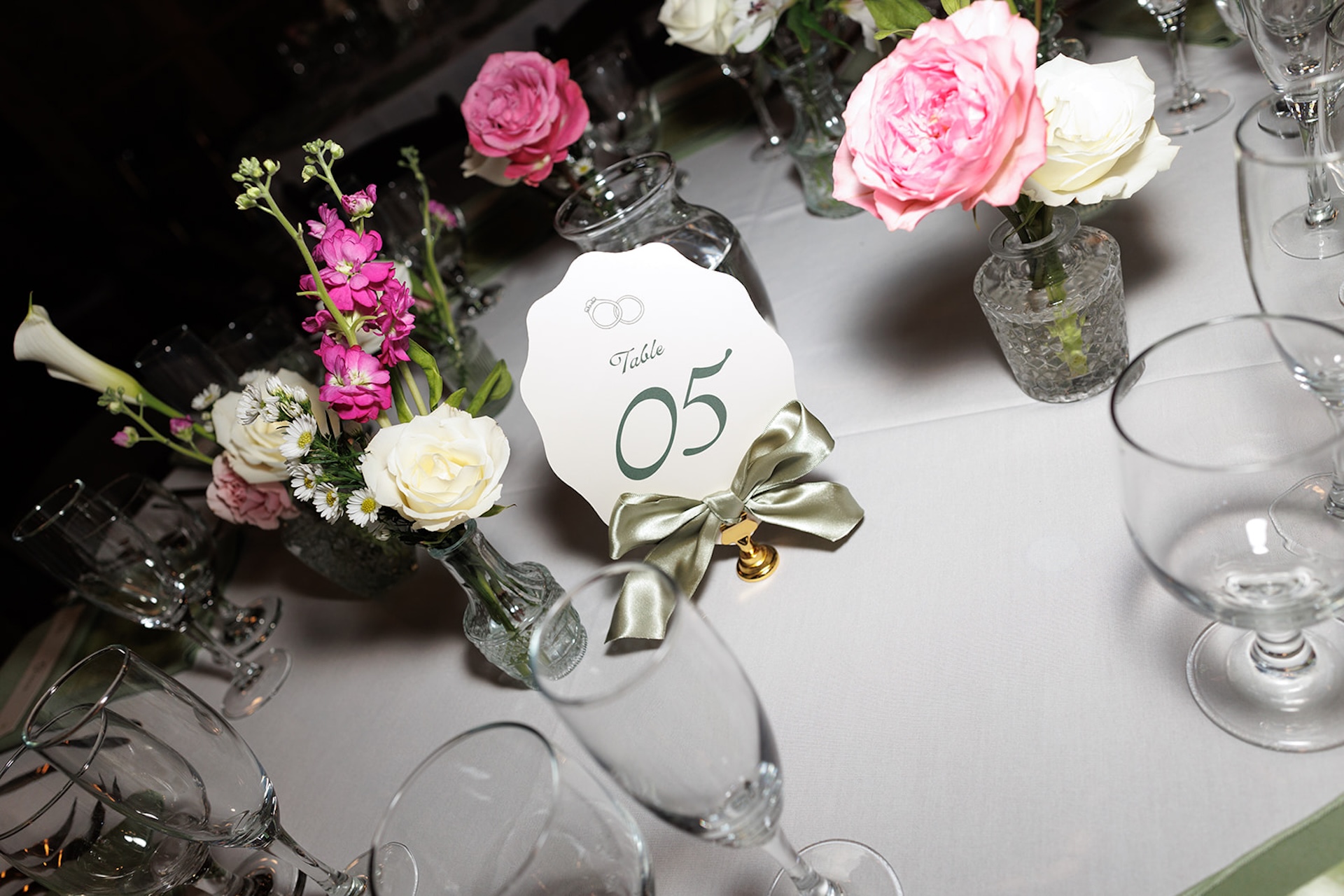 Wedding reception decor featuring vibrant florals during colorful weddings reception