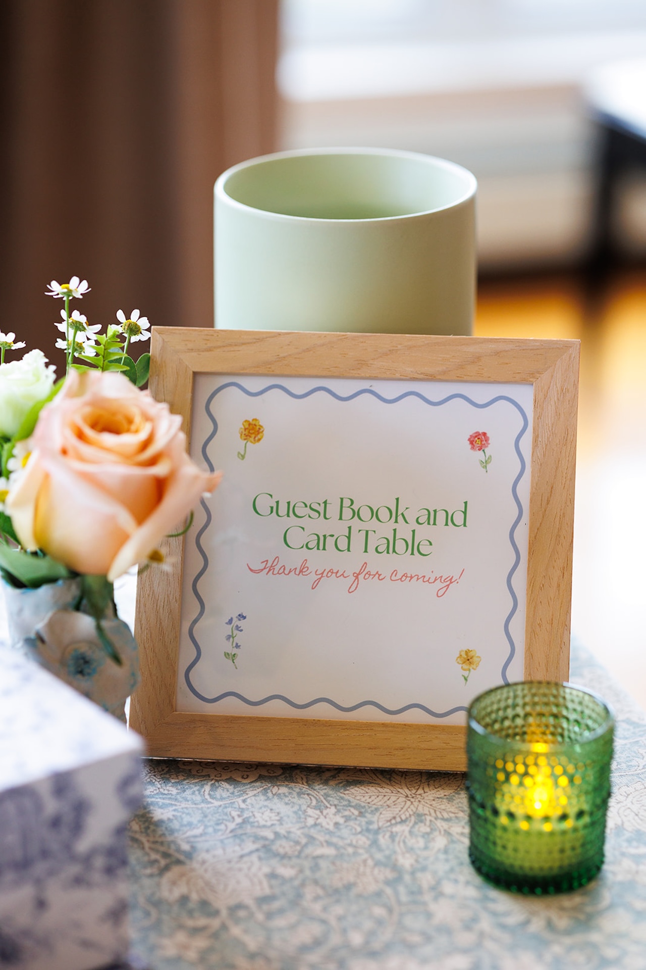 Guest book table decorated during colorful weddings reception