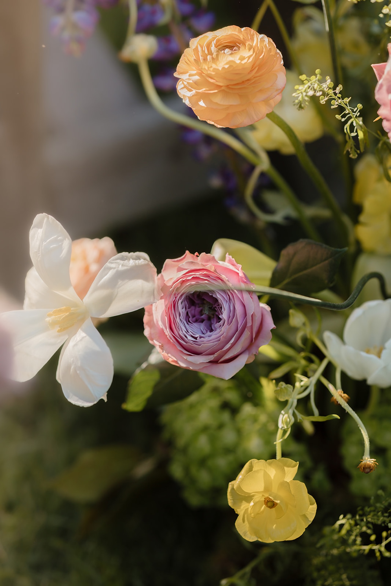 Colorful wedding bouquet featuring vibrant pink and orange flowers