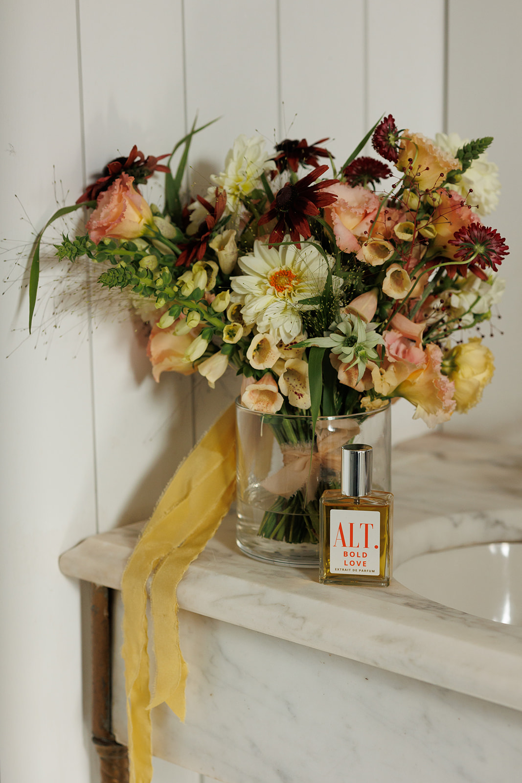 Colorful bouquet and perfume for the traditional wedding