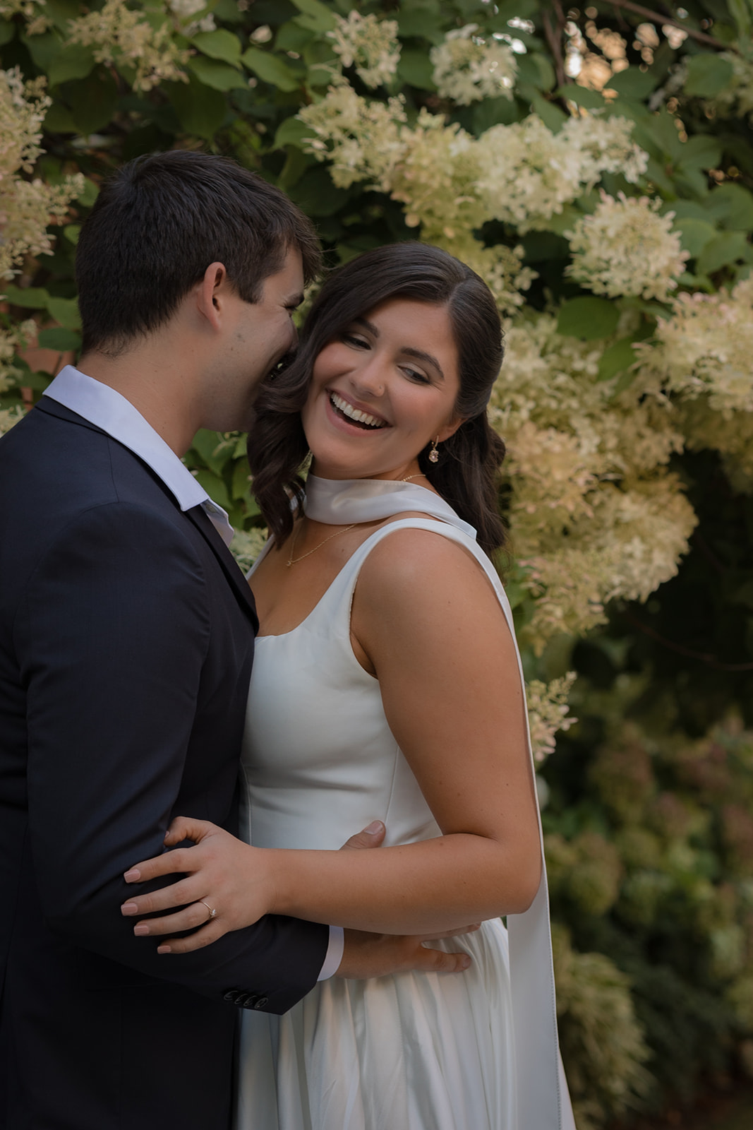 Couple smiling together at their intimate wedding