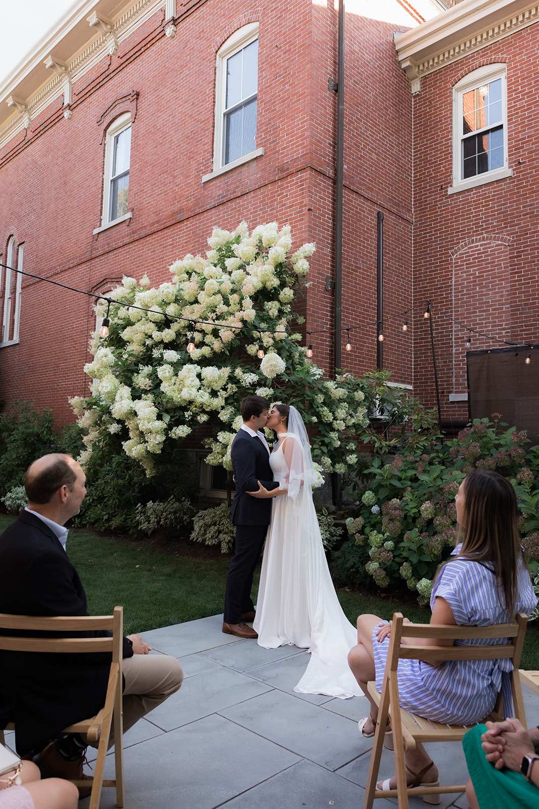 Couple exchanging vows at their intimate wedding