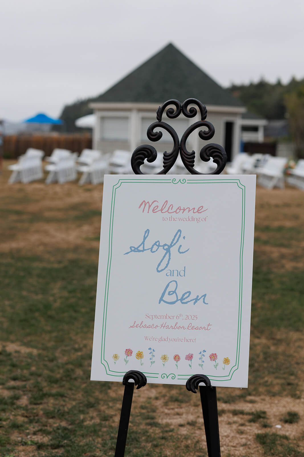 Welcome sign for a coastal Maine micro wedding ceremony at Sebasco Harbor Resort overlooking the waterfront.